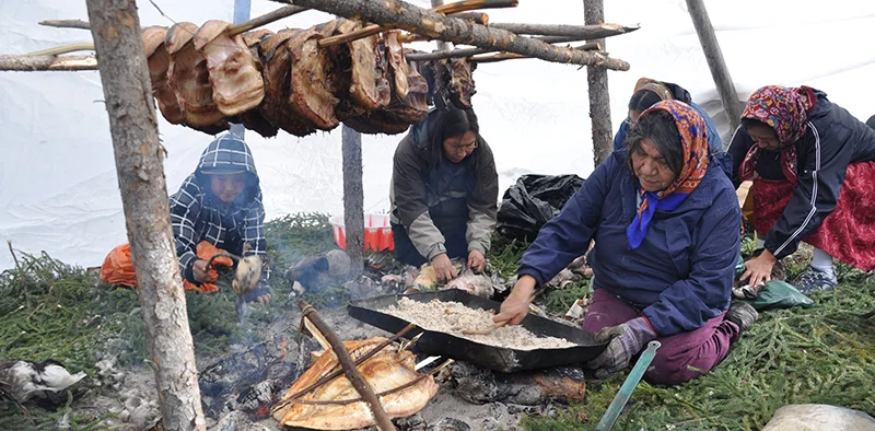 women preserving meat